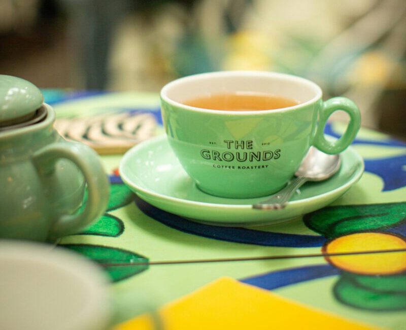 A warm cup of tea at The Grounds café in Alexandria, NSW, Australia.